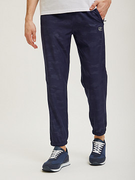 Синие спортивные брюки Overcome с принтом камуфляж